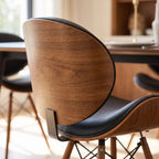 Close-up detail showing wood-grain finish on dining chair backrest