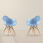 Two light blue Eames DAW dining armchairs with beech wood legs, illustrative studio set of 2