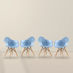 Four light blue Eames DAW dining armchairs with beech wood legs, illustrative studio set of 4