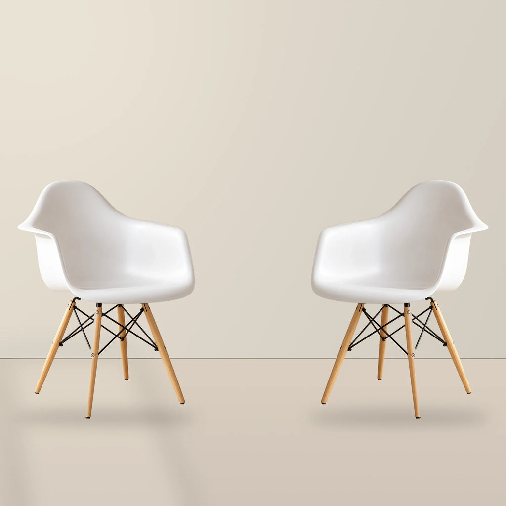 Two white Eames DAW dining armchairs with beech wood legs, illustrative studio set of 2