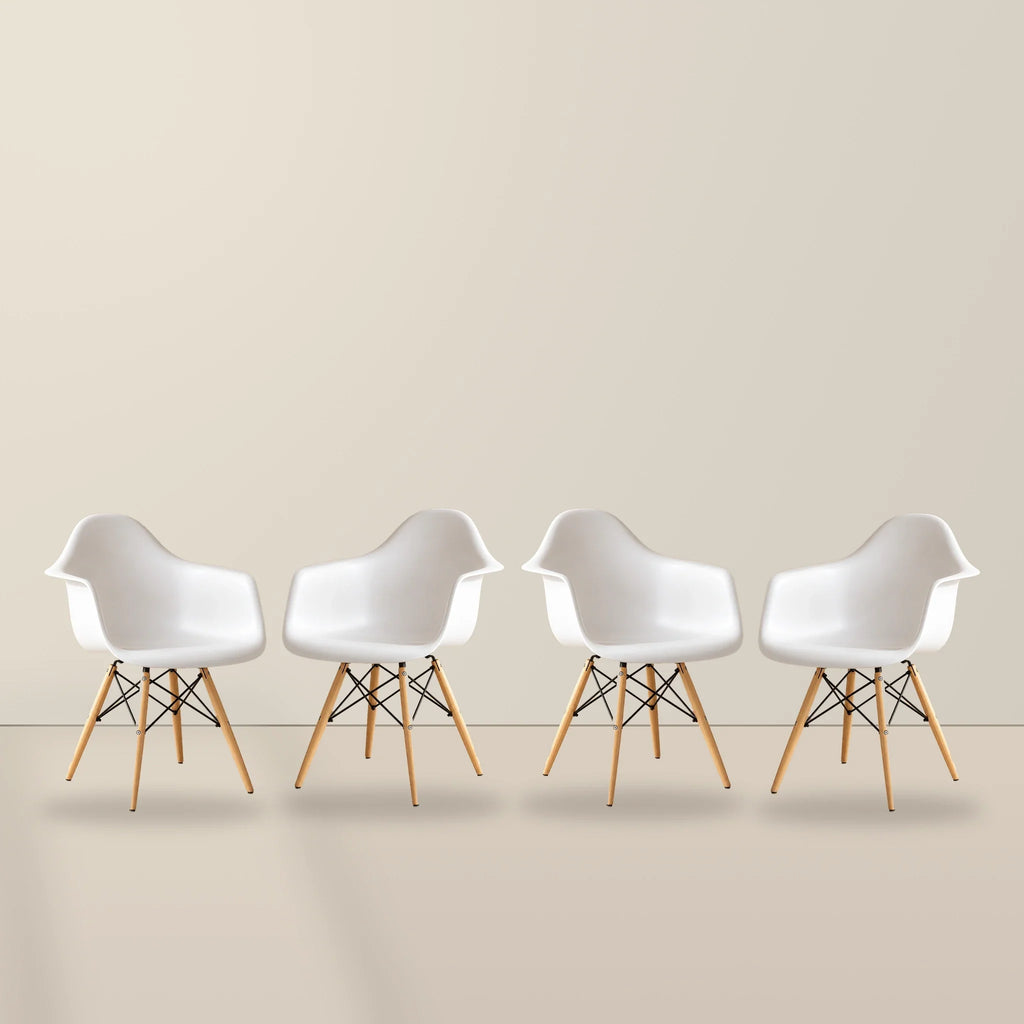 Four white Eames DAW dining armchairs with beech wood legs, illustrative studio set of 4