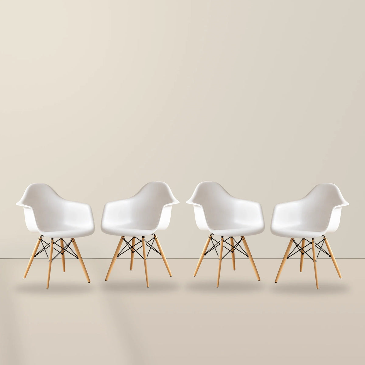 Four white Eames DAW dining armchairs with beech wood legs, illustrative studio set of 4