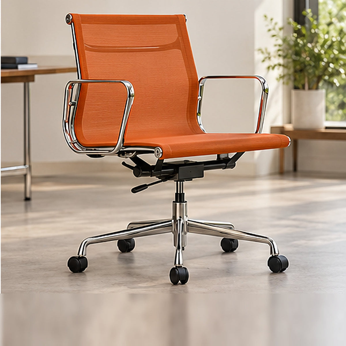 EA117/EA119 Mesh Chair — EA 117 – Low Back / Orange / Chrome Frame — premium lifestyle photo
