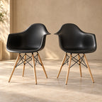 Set of two black Eames DAW dining armchairs